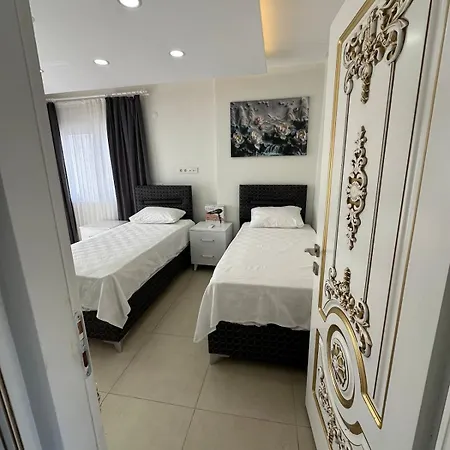 Villa Assos Suits 2