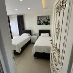 Villa Assos Suits 2